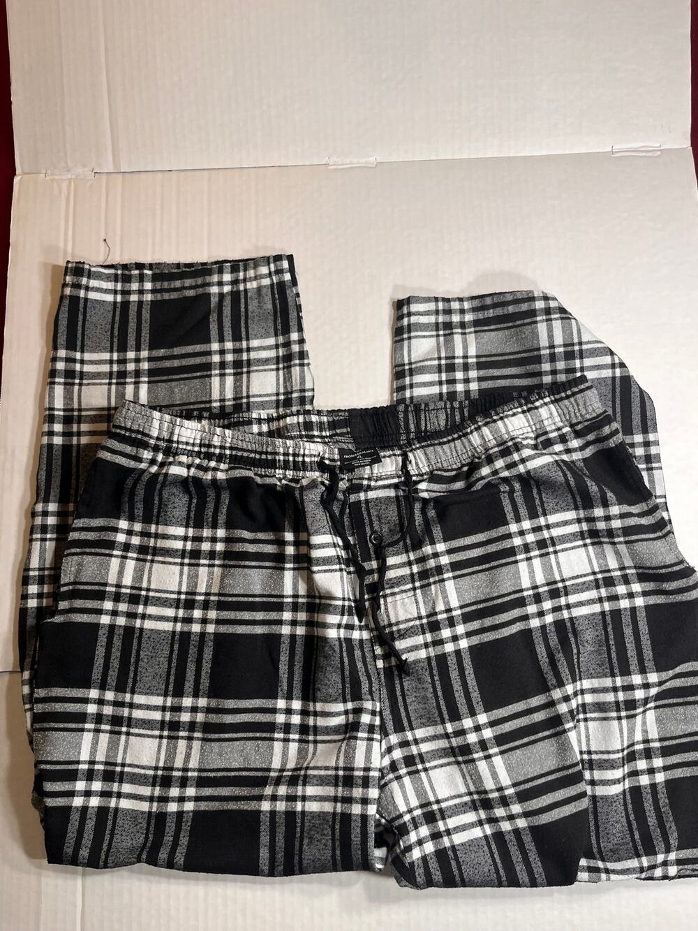 Real Essentials XL men's pajama pants feature a black and White plaid pattern